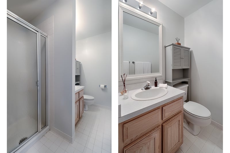 Hall bath on upper level features a stall shower and a single vanity.