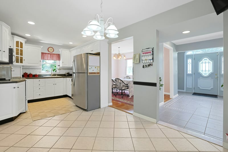 Kitchen view toward dining room and foyer
