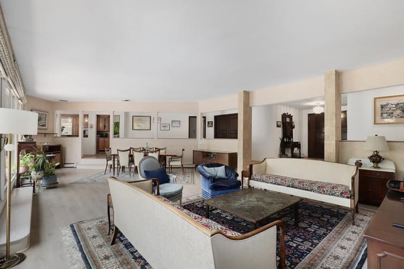 Living room featuring wood finished floors and baseboard heating