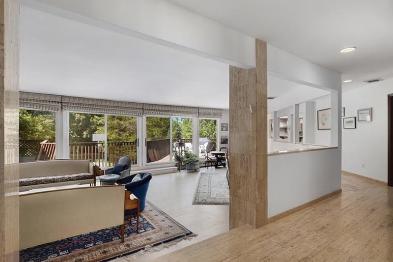 Living room featuring wood finished floors and recessed lighting