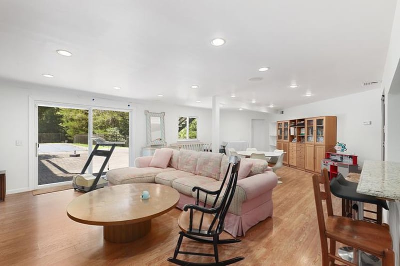 Living room featuring light wood-style floors and recessed lighting