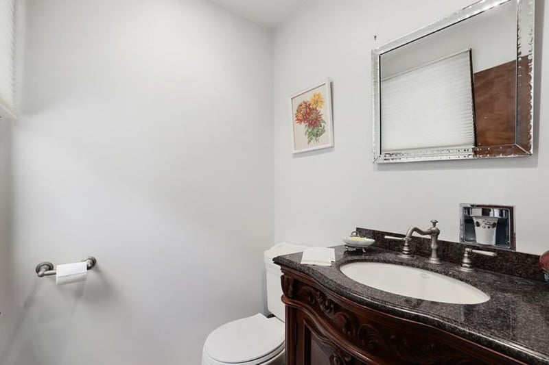 Bathroom featuring toilet and vanity