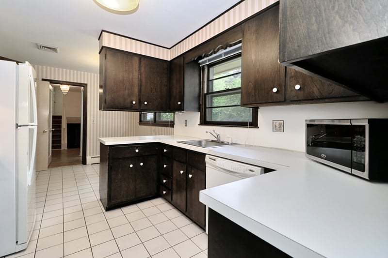 Alternate view of kitchen which provides access to attached 2 car garage.