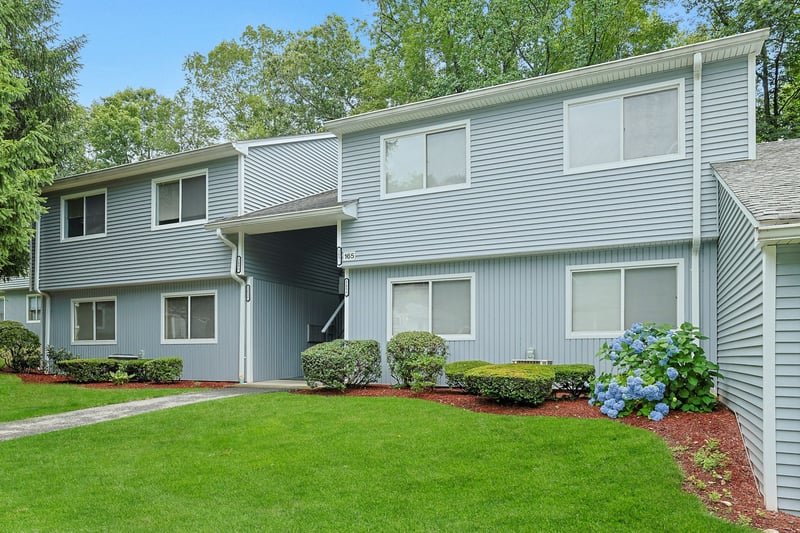 View of front of property with a front lawn