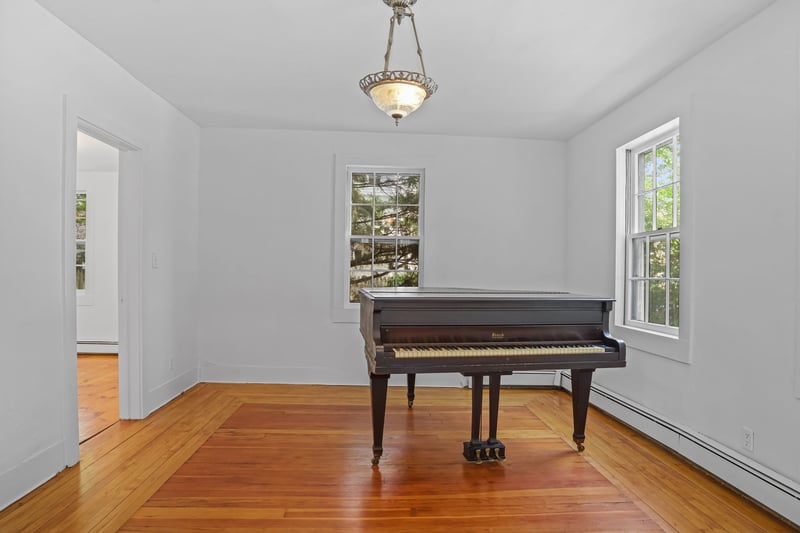 Living Room with entry into Family Room and Dining Room