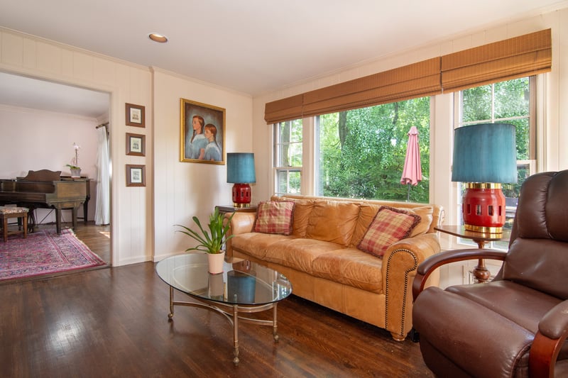 A separate, more casual family room provides the perfect space for relaxing, lounging, or watching TV in comfort.