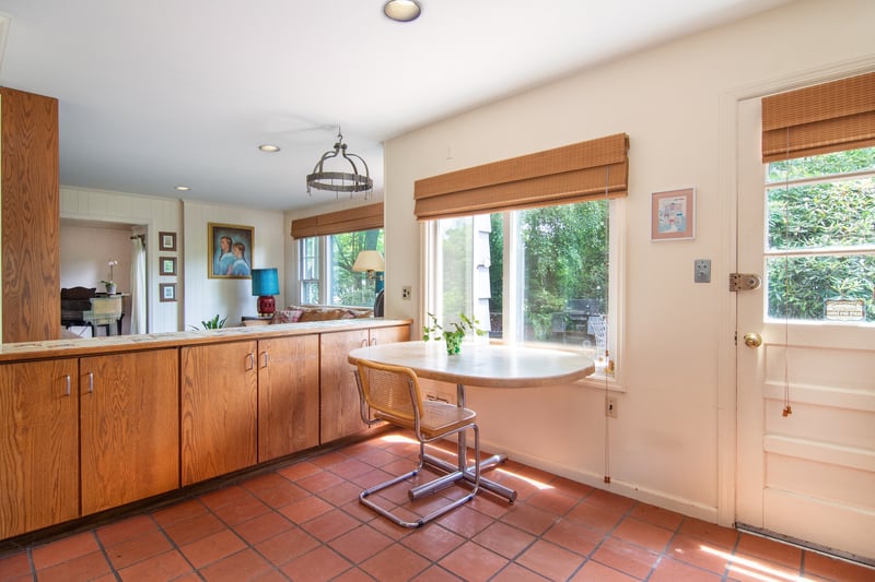 The family room flows seamlessly into a spacious kitchen, creating an open environment perfect for socializing while preparing meals.