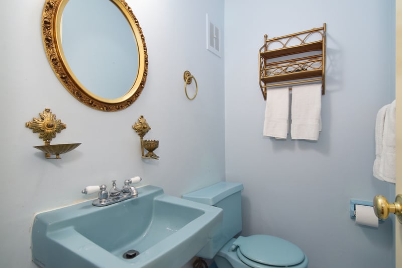 A convenient half-bath rounds out the first floor.