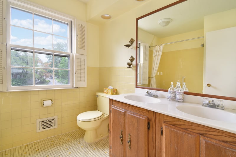 A well-appointed full bathroom in the hallway serves the bedrooms outside of the master suite.