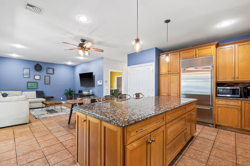 Open concept kitchen with large center island is the heart of this home