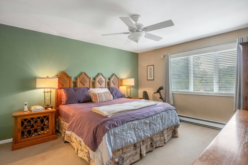 Primary bedroom featuring lots of light and plenty of closets