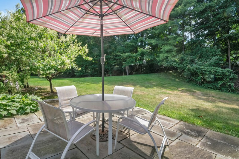 View of patio with outdoor dining area