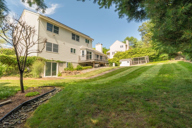 44 / 45Back of house with a yard