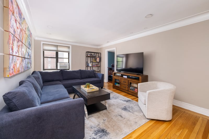 Living room showing entrance to Primary bedroom