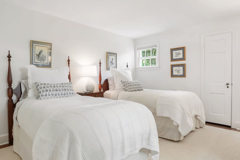 Third Bedroom with neutral color walls and carpet