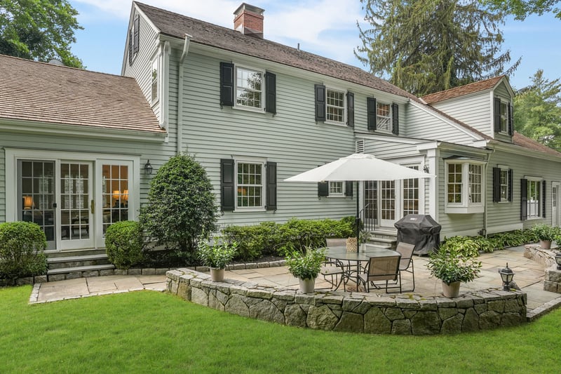 Bluestone Terrace bordered by stone wall