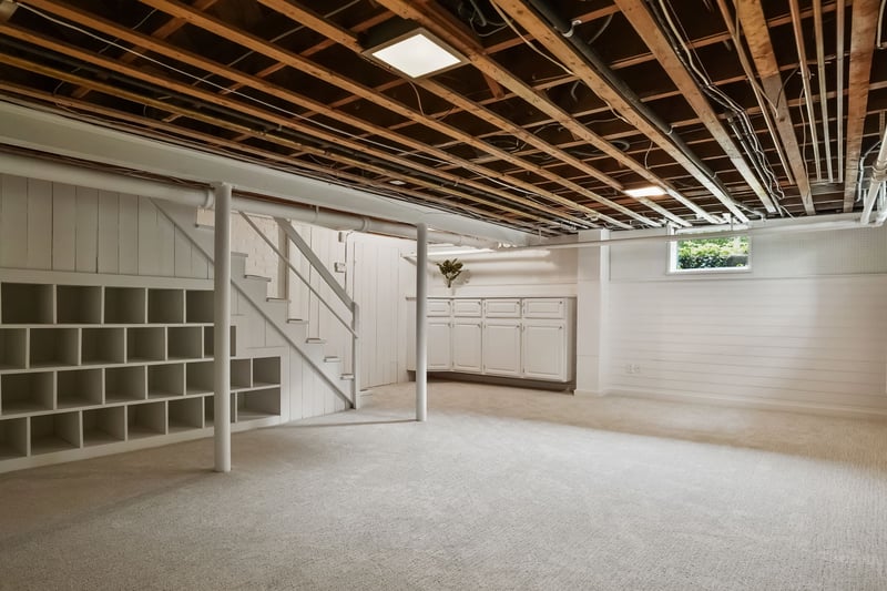 Partially finished basement with brand new carpet.