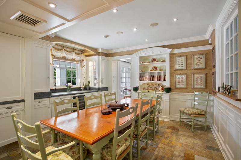 Another view of the entire kitchen featuring Honed Granite countertops and Quartzite stone tile floors.