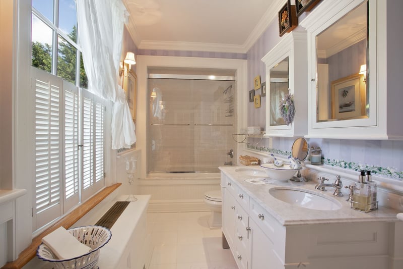 Third floor hall bath with double vanity.
