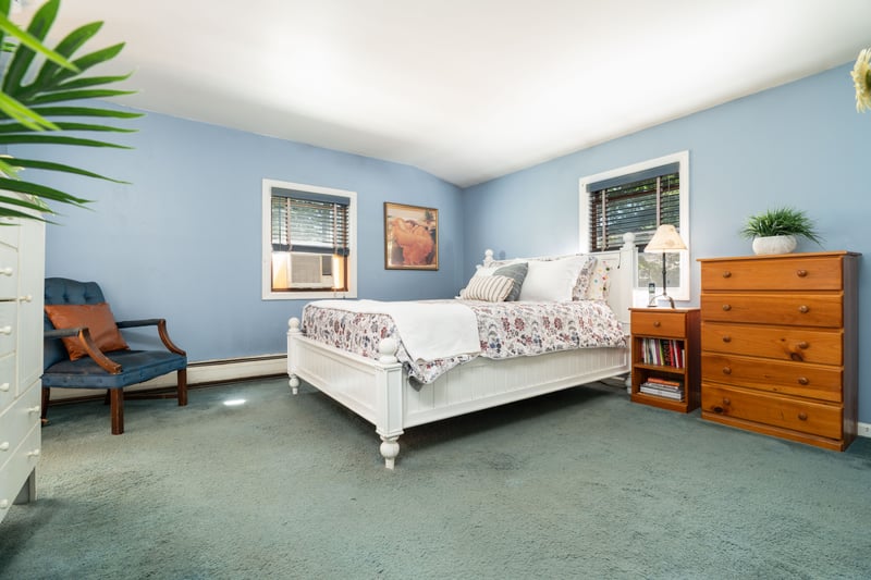 First floor carpeted primary bedroom.