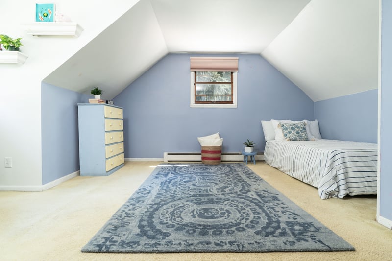 Upstairs bedroom with vaulted ceiling