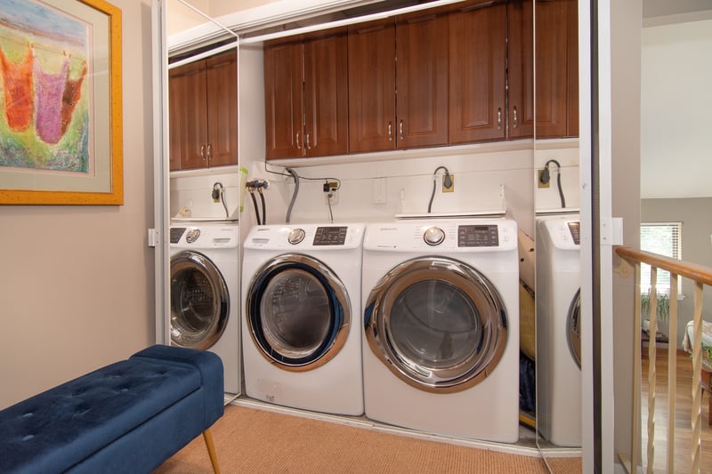 Laundry room with cabinet space and separate washer and dryer....