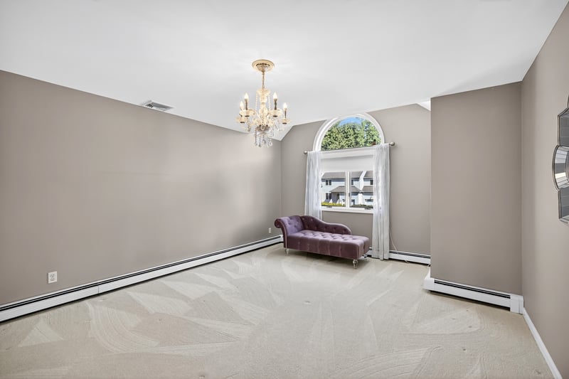 Bedroom #1 offers a generous layout with plenty of closet space plus cathedral height ceiling.