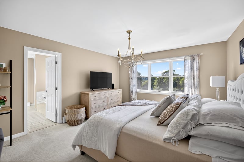 Primary Suite with beautiful light and evening sunsets.