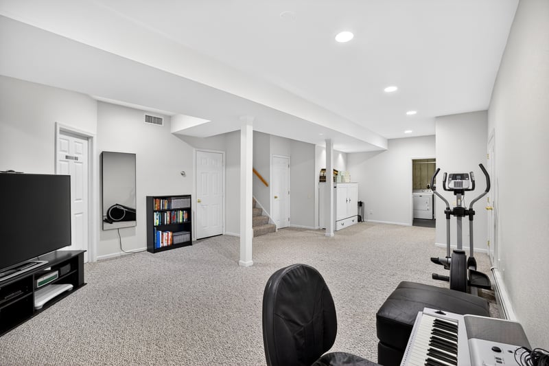 Lower level recreation room with direct access outside.