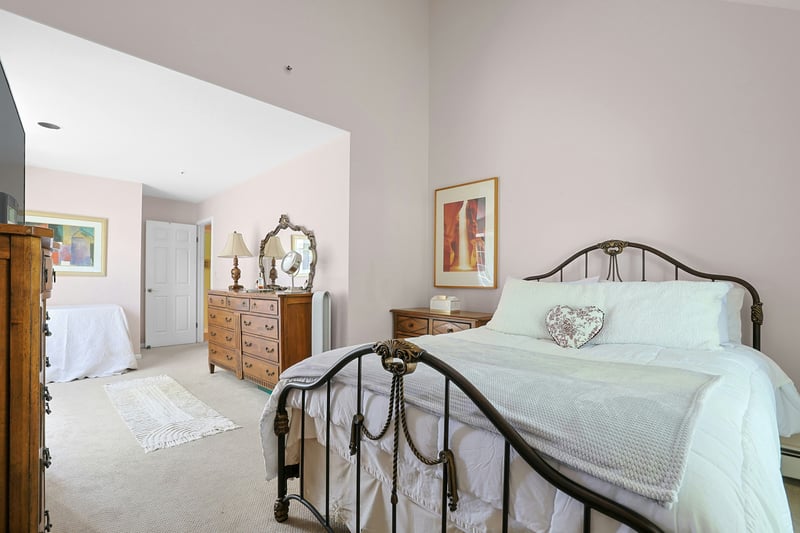 View from bedroom to sitting area, walk in closet.