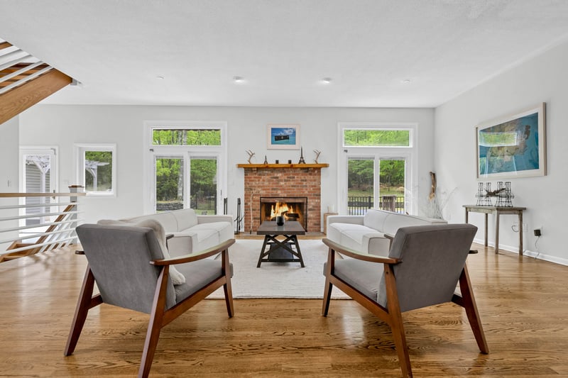 lots of natural lighting from the sliders flanking the fireplace