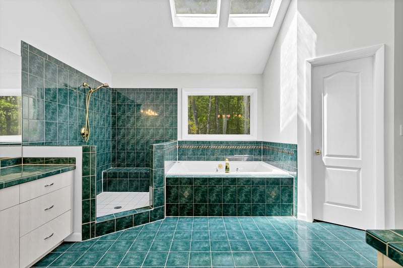 (14/38)Primary bathroom suite with walk in closet, shower and jacuzzi tub