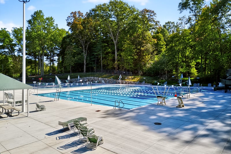 Brand New Pleasantville pool featuring a patio area