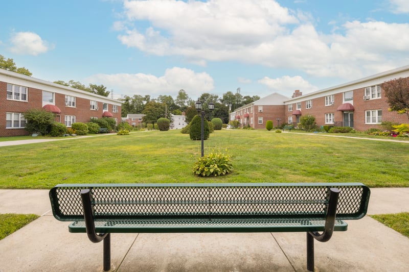 View of home's community featuring a yard and a residential view