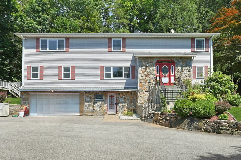 Plenty of parking in driveway and 2 car garage.