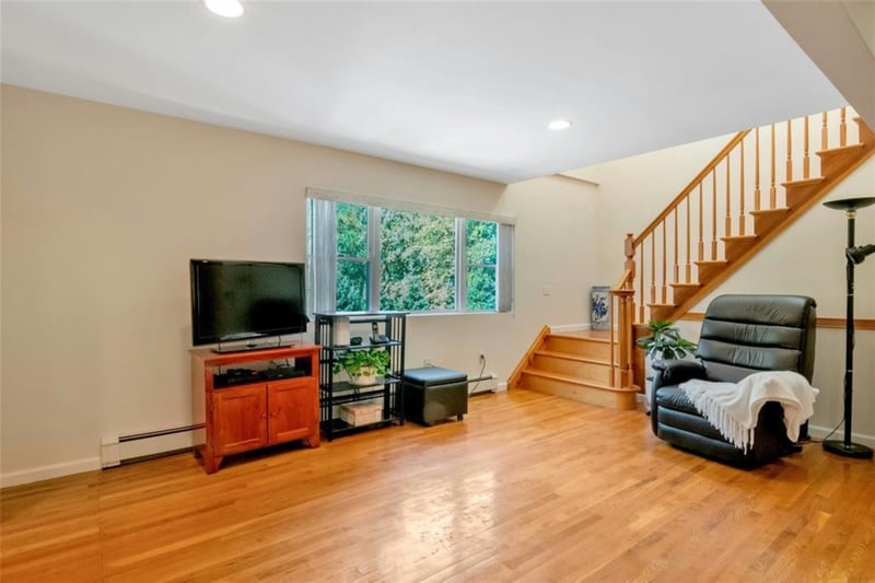 Actual View - Big picture window, and skylight over stairs bring in the light.