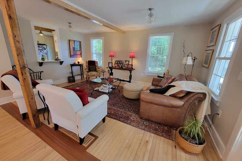 Open floor plan showing living area, Unit 1
