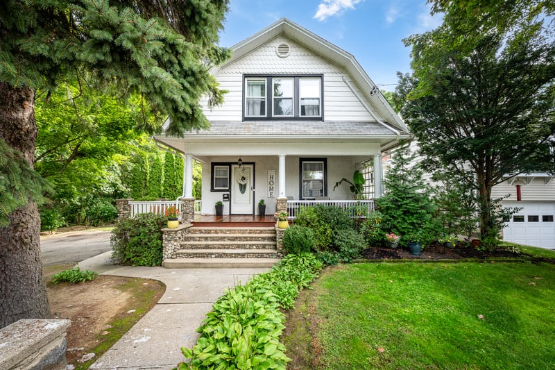 Charming Dutch Colonial with curb appeal for days.