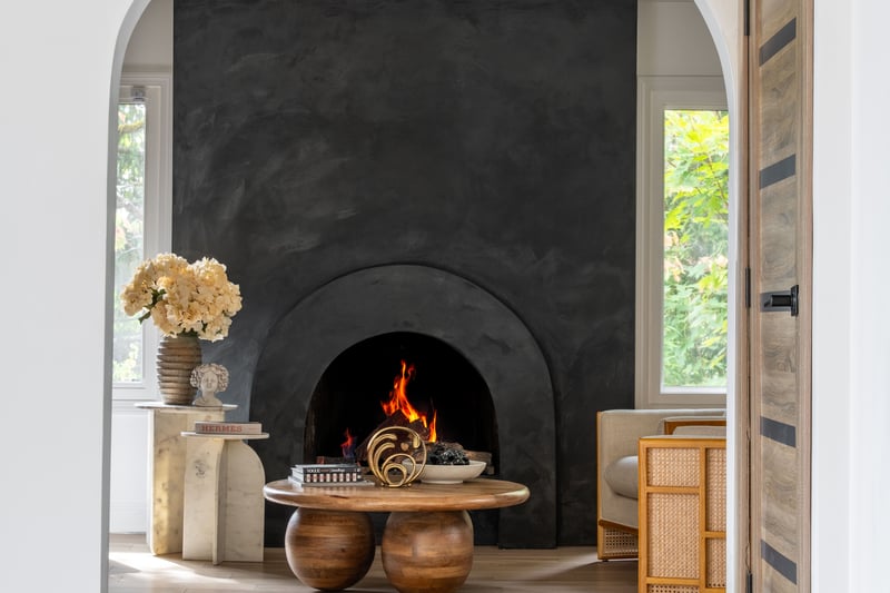Detailed view of arched walkways and a warm lit fireplace...