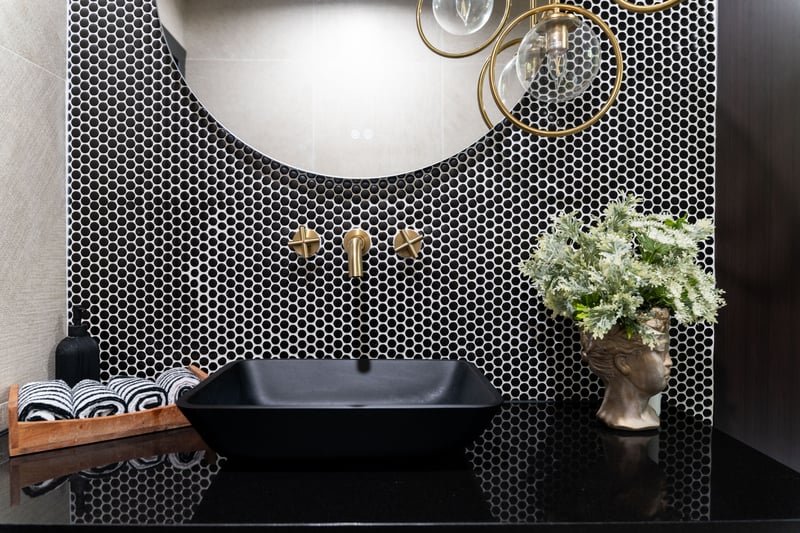 Bathroom with a sink and a freestanding tub