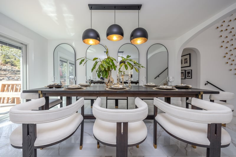 Dining space with light marble finish floors