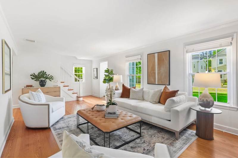 This family room is open and flooded with sunlight.