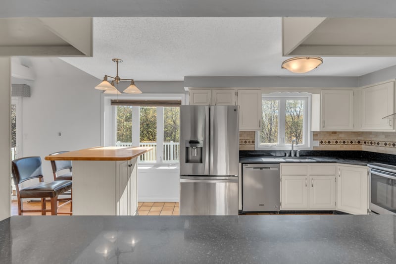 Opening to the kitchen counter from Dining Room.