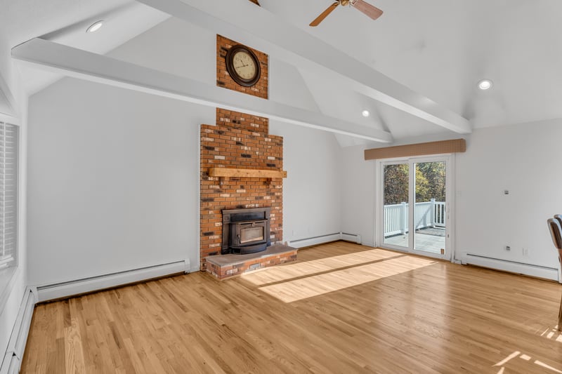 Fireplace with wood stove insert.