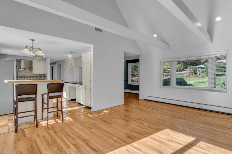 Family room open to the kitchen and dining room.