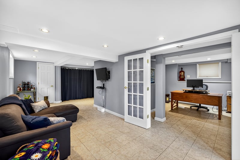 Alternate view of Recreation room with french doors to the home office space