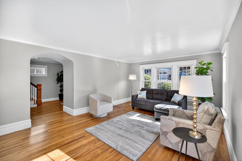 Refinished hardwood floors and an abundance of natural light