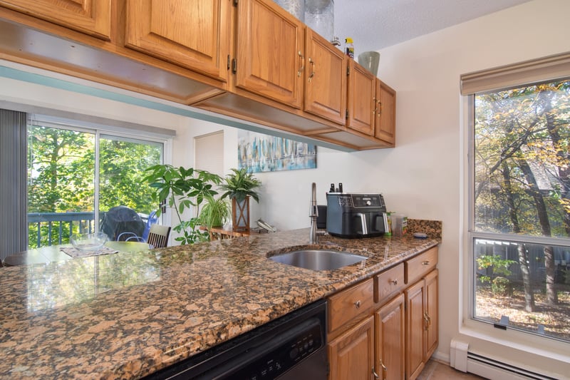 The open cut-out in the kitchen ensures you stay part of the social flow while preparing food!