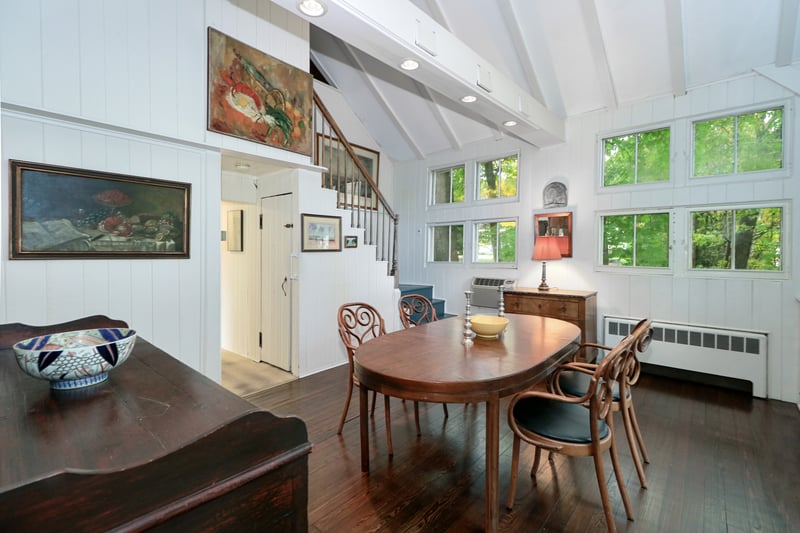 The stairs in this picture lead to the loft, which is currently a bedroom, but could be an office too.