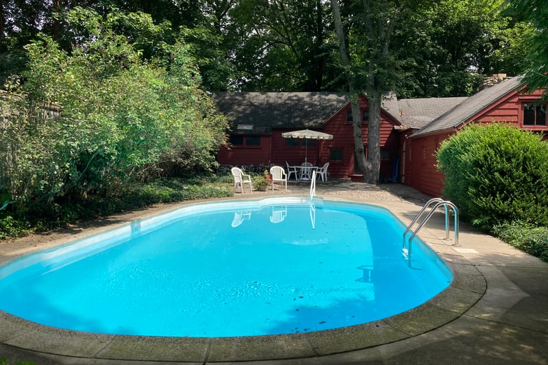 An intriguing house, with a lovely pool. Close to the train. Great size. 3-4 bedrooms. Natural landscaping. Low taxes. In Westport. Make it your own!